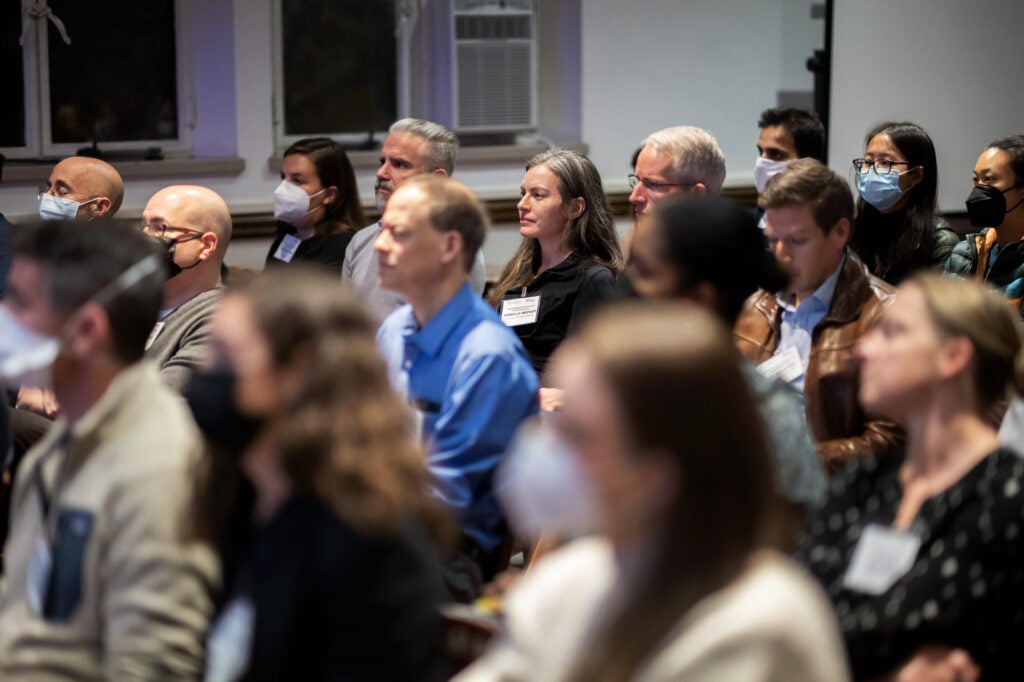 Attendees listen to the first round of research presentations at CHIBE's behavioral science and health symposium